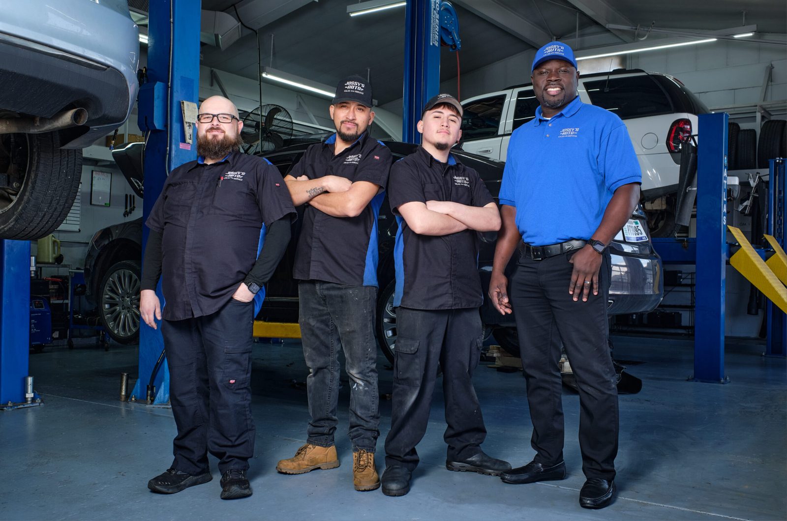 Jossy’s Auto shop cover photo: staff in Anderson, IN bay